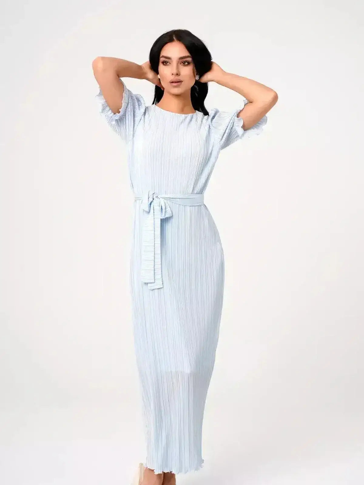 Angel Maxi Dress in light blue with pleats and waist tie, showcasing elegance and romantic style.