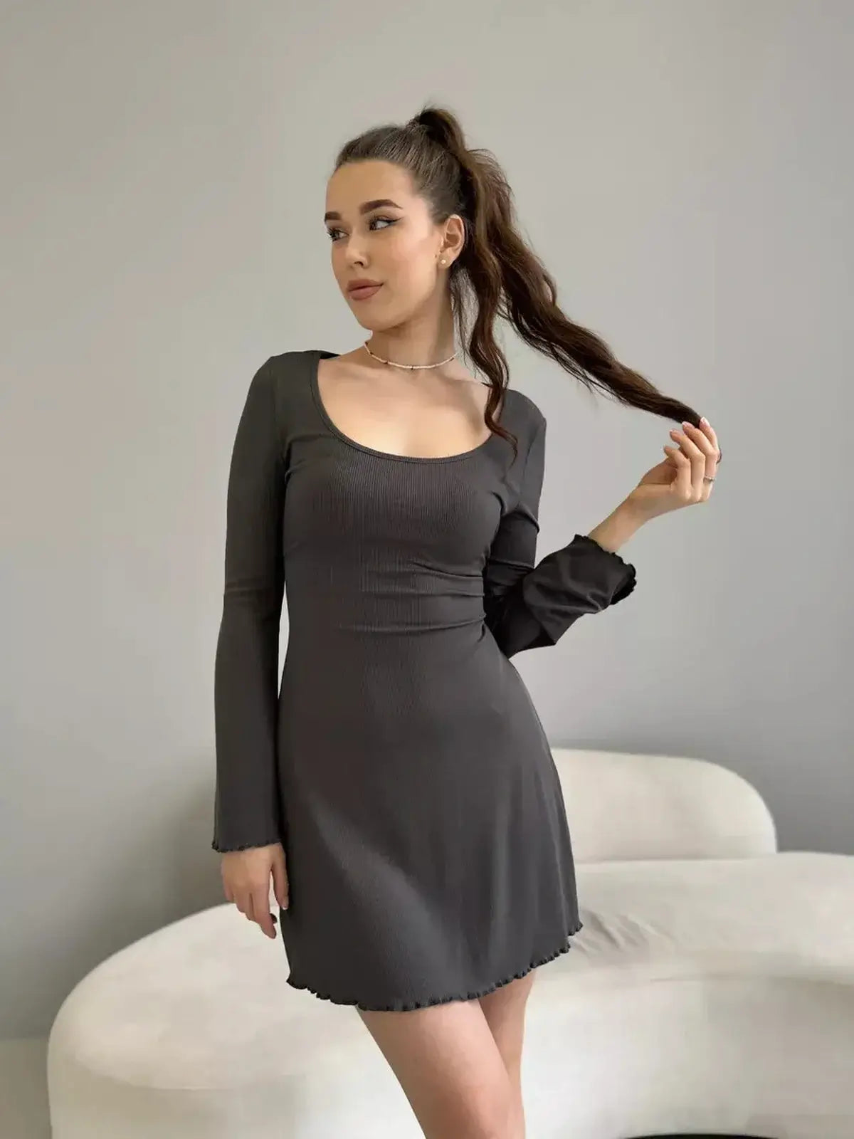 Ava Mini Dress by Lauven featuring a ribbed knit design, long sleeves, and a chic square neckline.