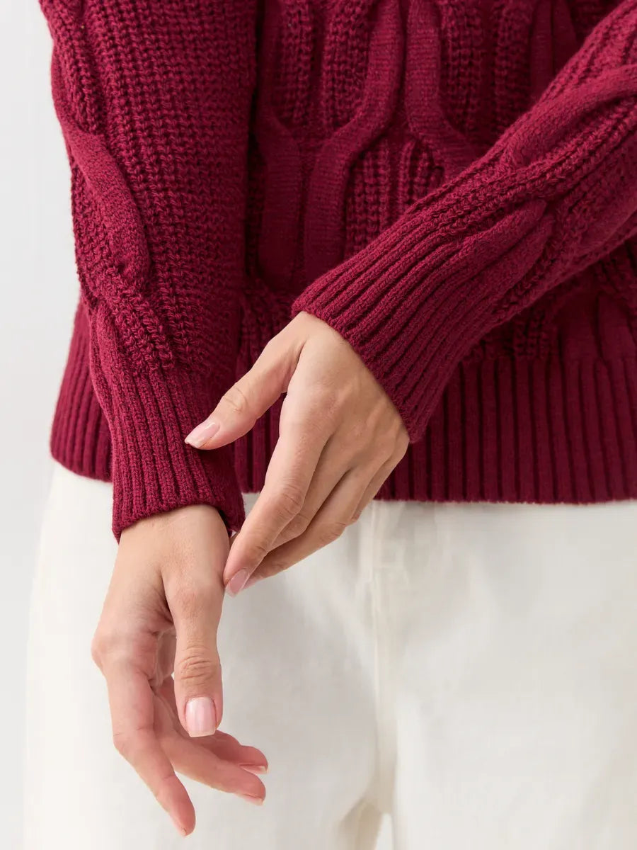 Bordeaux Knitwear detail showing the stylish cable-knit pattern and ribbed cuffs of Lauven's women's wool-blend turtleneck sweater.