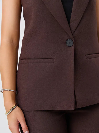 Cacao Suit Set by Lauven - close-up of sleeveless chocolate vest with a button and pockets, stylish and modern.