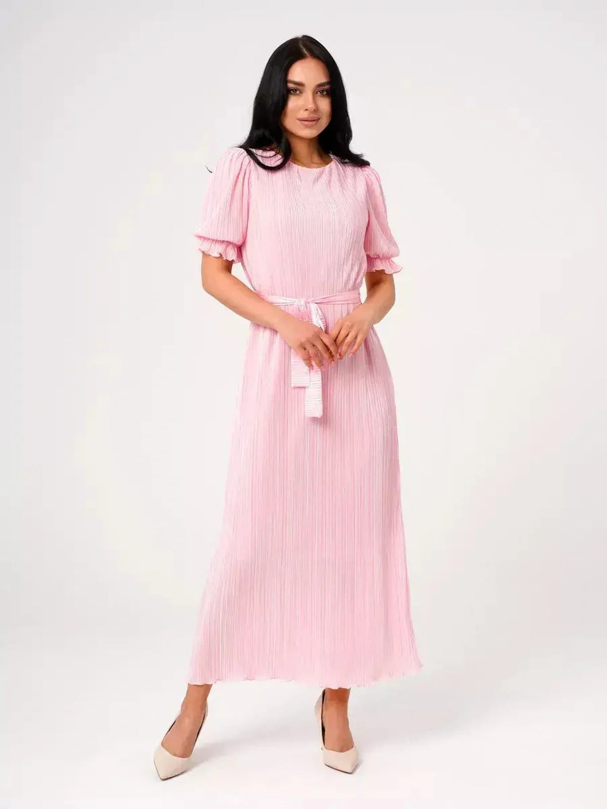 Candy Maxi Dress in pink, featuring pleated elegance, puff sleeves, and a tie waist for a timeless feminine look.