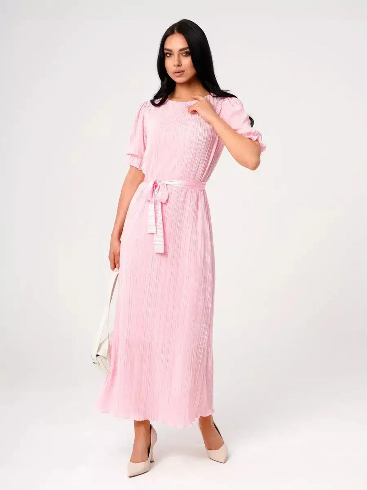 Candy Maxi Dress featuring pleated elegance, puff sleeves, and a tie waist in soft pink color.