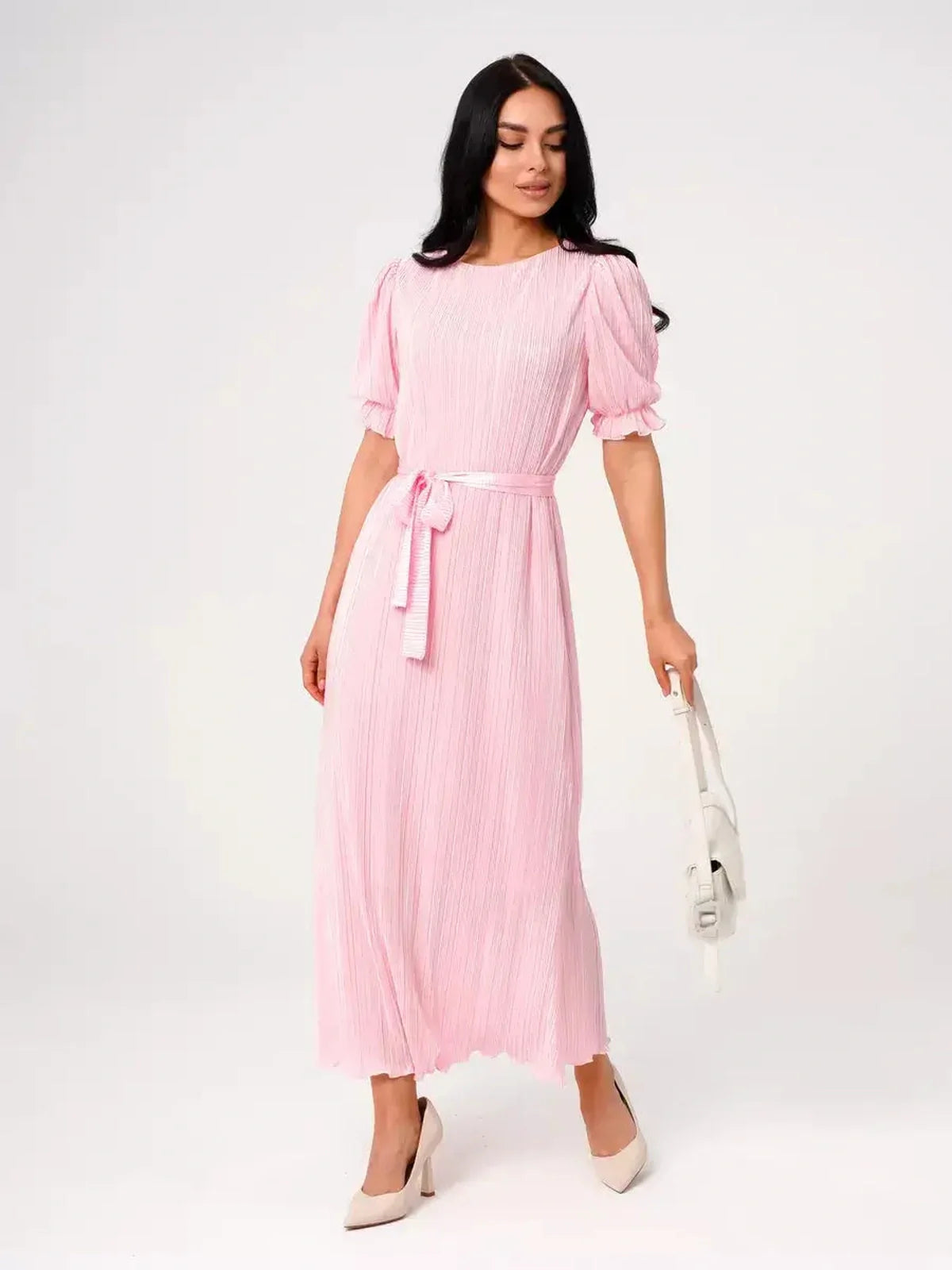 Candy Maxi Dress in soft pink with pleated design, puff sleeves, and tie waist for a refined, feminine look.