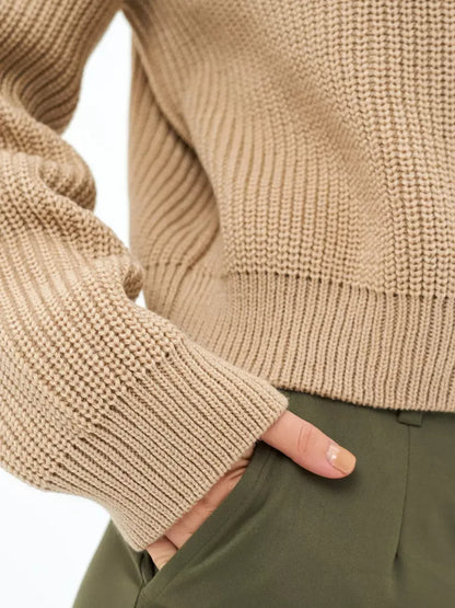 Cappuccino Sweater by Lauven, oversized knit in warm beige, showcasing textured fabric and relaxed fit.