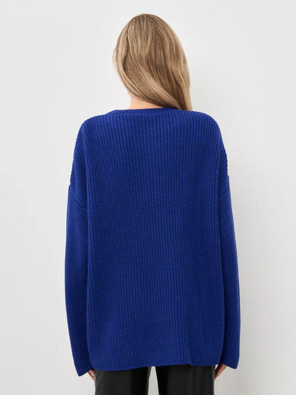 Back view of the oversized Celeste Sweater in electric blue, by Lauven, showcasing its relaxed fit and crew neckline.