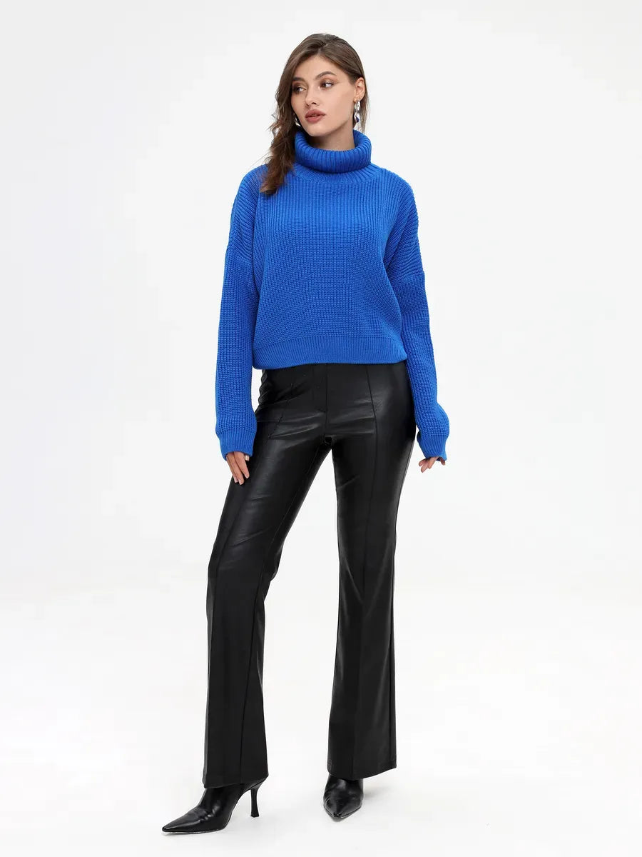 Celeste Sweater by Lauven - Oversized blue knit with turtleneck worn with black leather pants for a chic look.