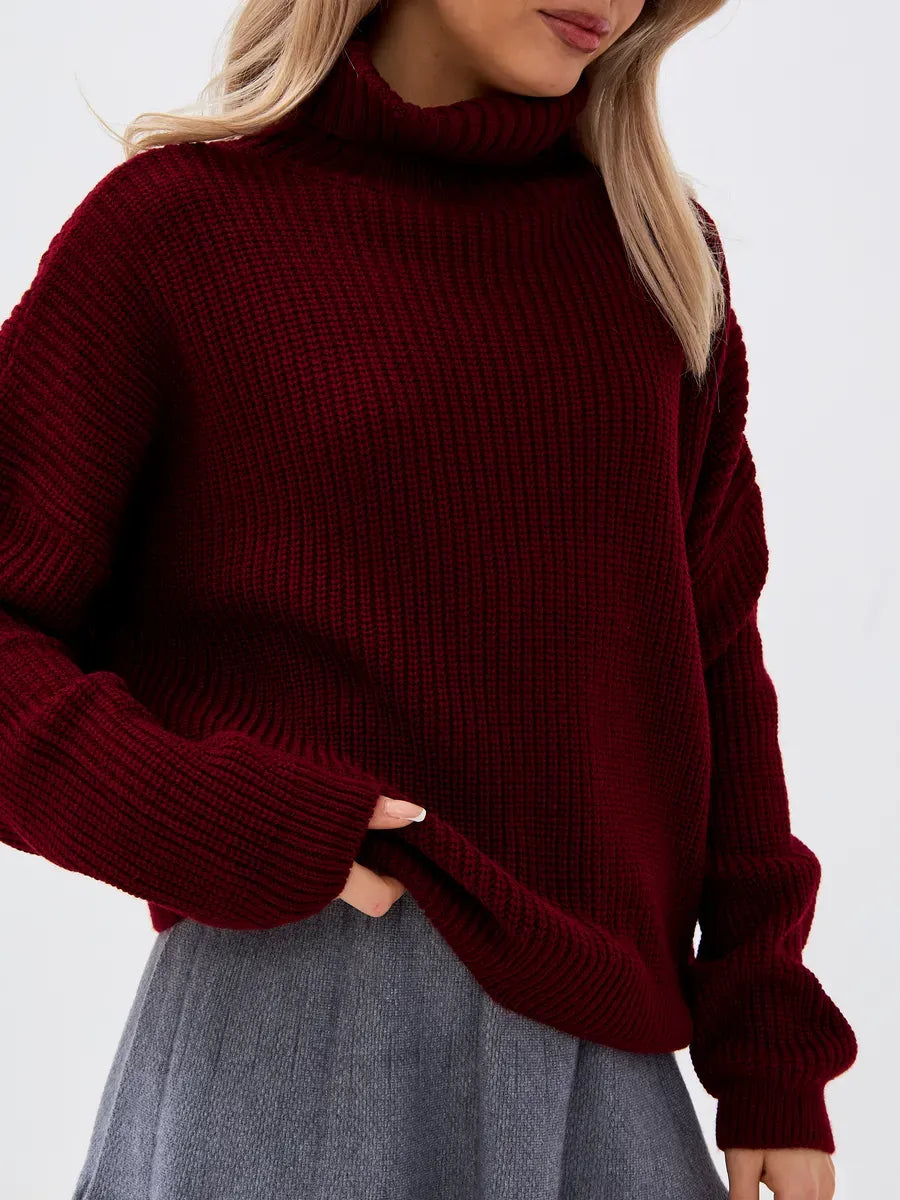 Crimson Pullover by Lauven – Oversized burgundy knit sweater with high neck detail.
