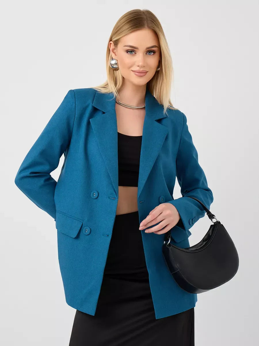 Diana Blazer from Lauven, a classic cropped women’s blazer in teal, styled with a black outfit and handbag.
