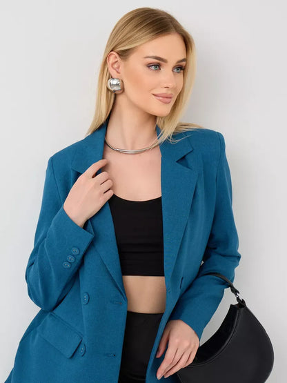 Diana Blazer by Lauven worn by a model showcasing classic cropped elegance in blue.