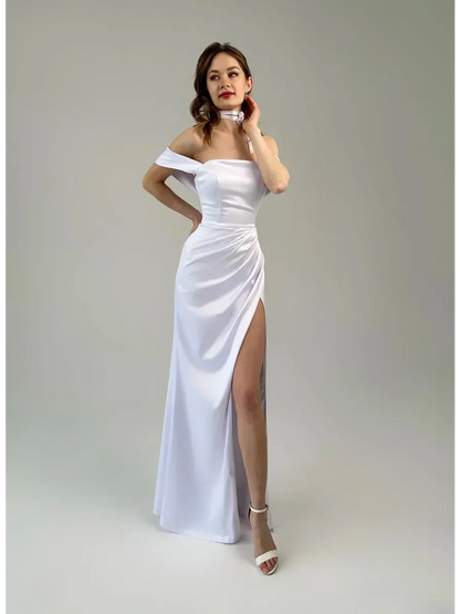 Eira Occasion Dress by Lauven - Elegant white satin off-shoulder gown with draping and high leg slit.