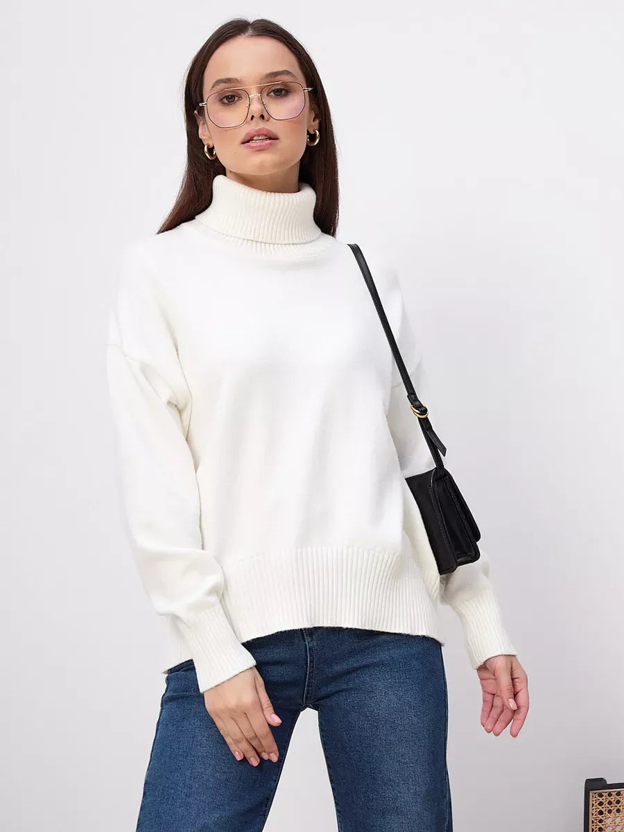 Elara Sweater by Lauven, a milk white turtleneck knitwear staple for women, offering timeless style and comfort.