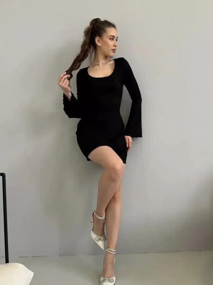 Emily Mini Dress by Lauven - Black ribbed knit long sleeve dress with square neckline and flared cuffs.