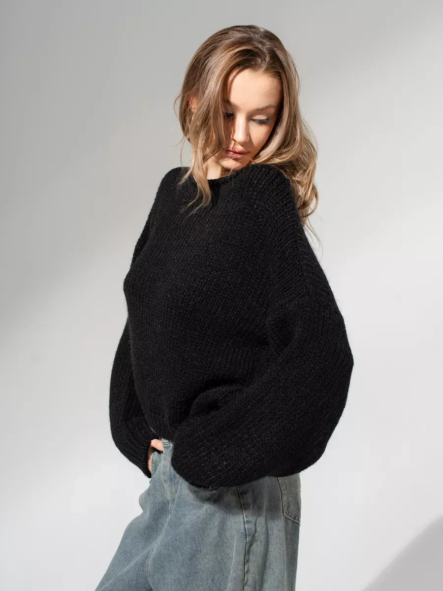 Noir Sweater by Lauven - Oversized off-shoulder knit in classic black, showcasing modern minimalism and cozy sophistication.