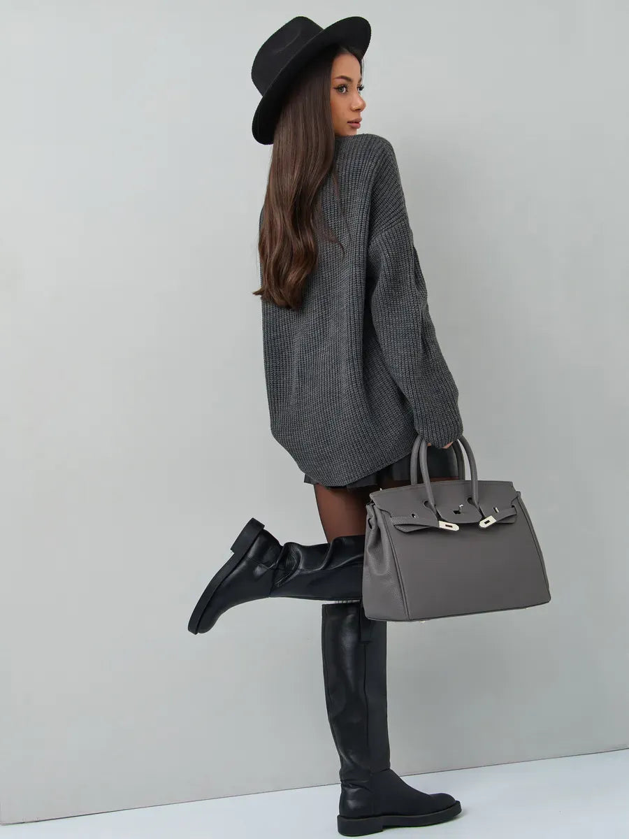 Vera Sweater — Oversized dark gray knit pullover by Lauven, paired with stylish accessories for a chic look.