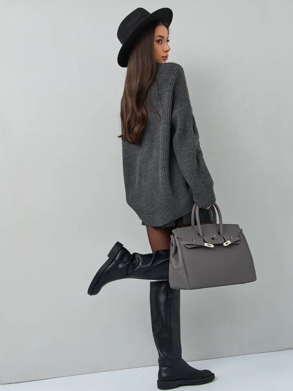 Vera Sweater — Oversized dark gray knit pullover by Lauven, paired with stylish accessories for a chic look.