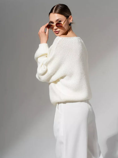 Ivory Sweater by Lauven, oversized off-shoulder knit in white, perfect for layering in colder months.
