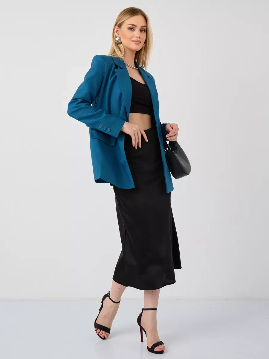 Diana Blazer by Lauven, featuring a classic cropped design, paired with a sleek black skirt for a chic look.