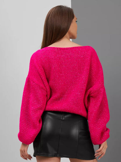 Isolde Sweater by Lauven, oversized fuchsia knit with boat neck and chunky texture, showcased from the back.