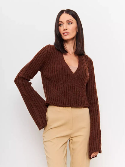 Orion Sweater by Lauven showcasing a cropped brown knit design with a deep V-neck and wide sleeves.
