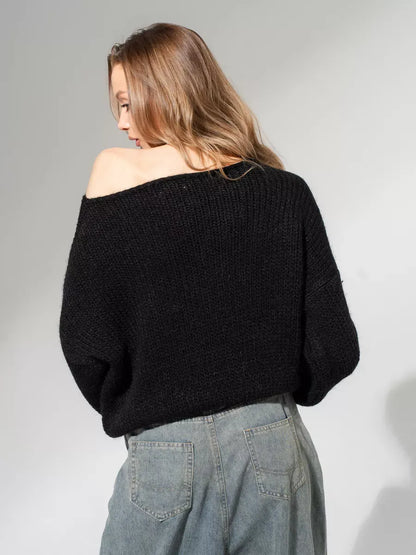 Noir Sweater by Lauven — Oversized off-shoulder knit in classic black, showcasing cozy sophistication and modern minimalism.