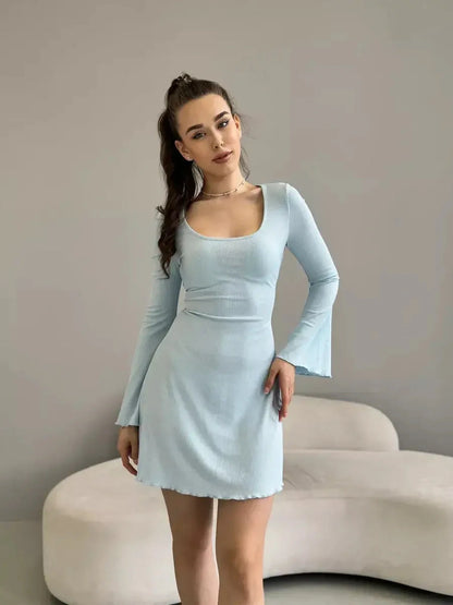 Isabella Mini Dress by Lauven in pastel blue ribbed knit, featuring long sleeves and flared hem for a modern look.