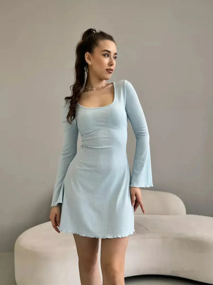 Isabella Mini Dress in pastel blue ribbed knit with long sleeves and flared hem by Lauven.