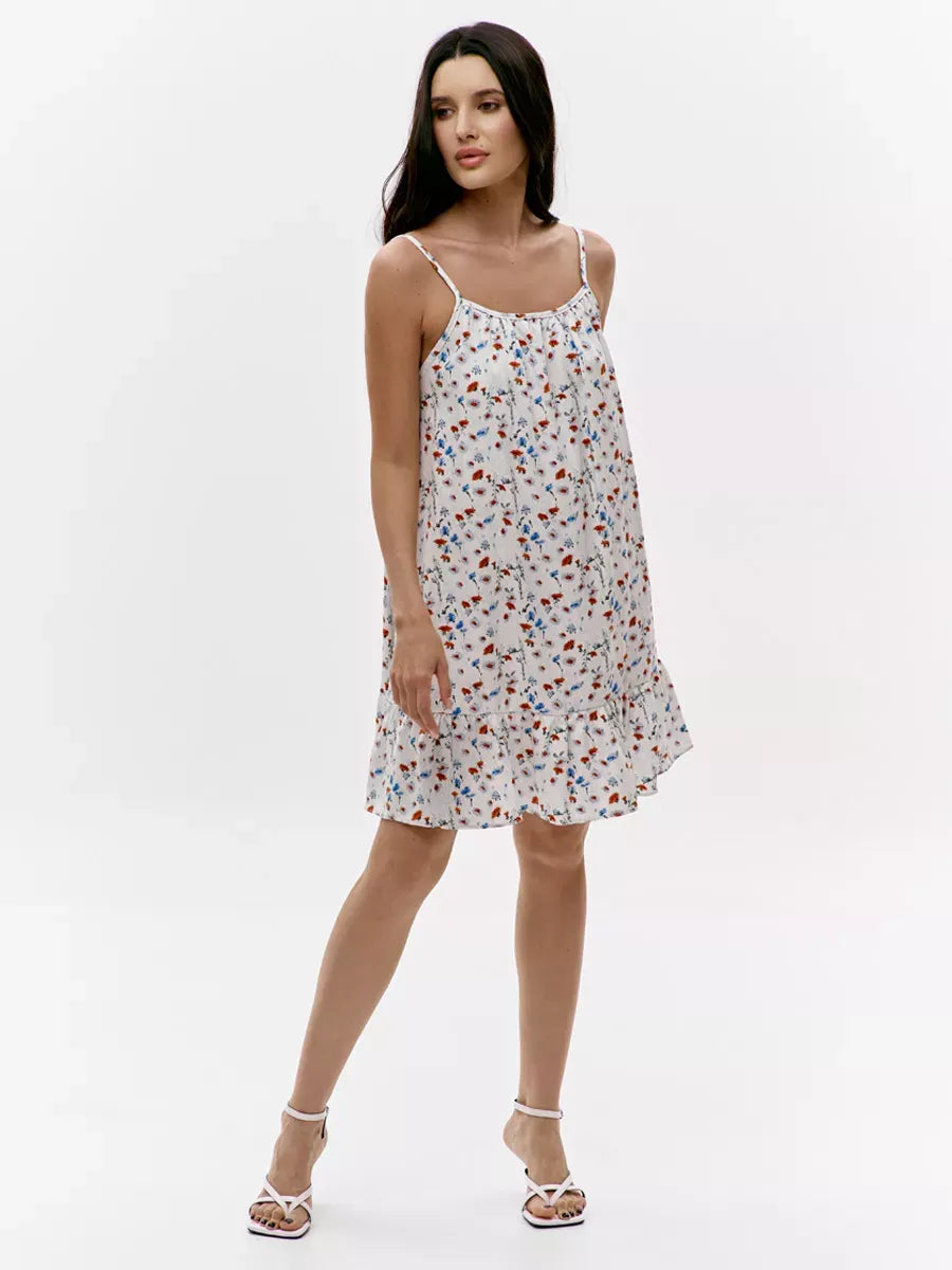 Ivory Mini Dress by Lauven featuring a floral print and open back design, perfect for summer outings.