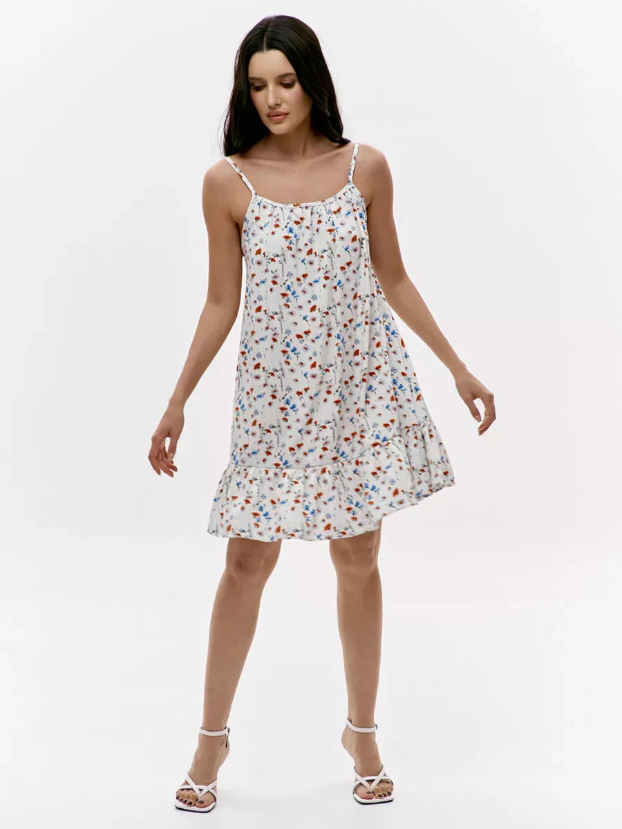 Ivory Mini Dress by Lauven featuring a floral print and open back design, perfect for summer outings.