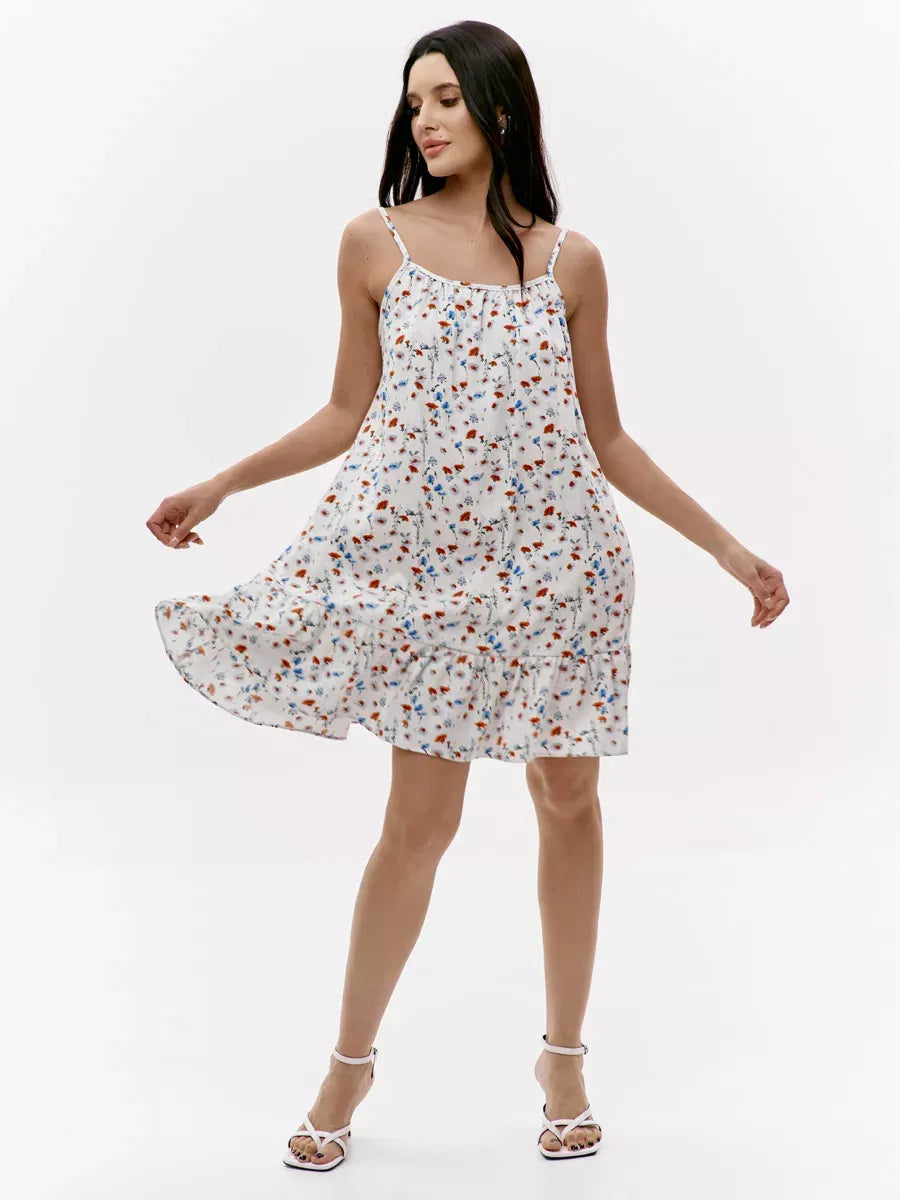 Ivory Mini Dress by Lauven featuring a floral print, open back design, and a flared silhouette, perfect for summer outings.