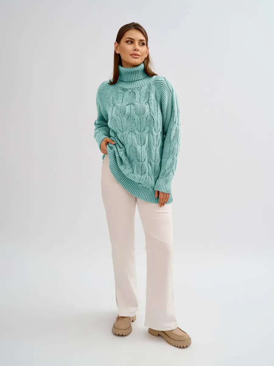 Laguna Sweater by Lauven — Oversized cable knit high neck design in a chic turquoise color.