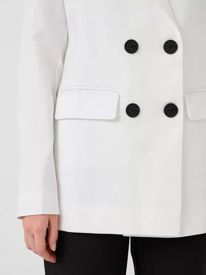 Alabaster Blazer by Lauven, oversized double-breasted white tailored jacket with black buttons.