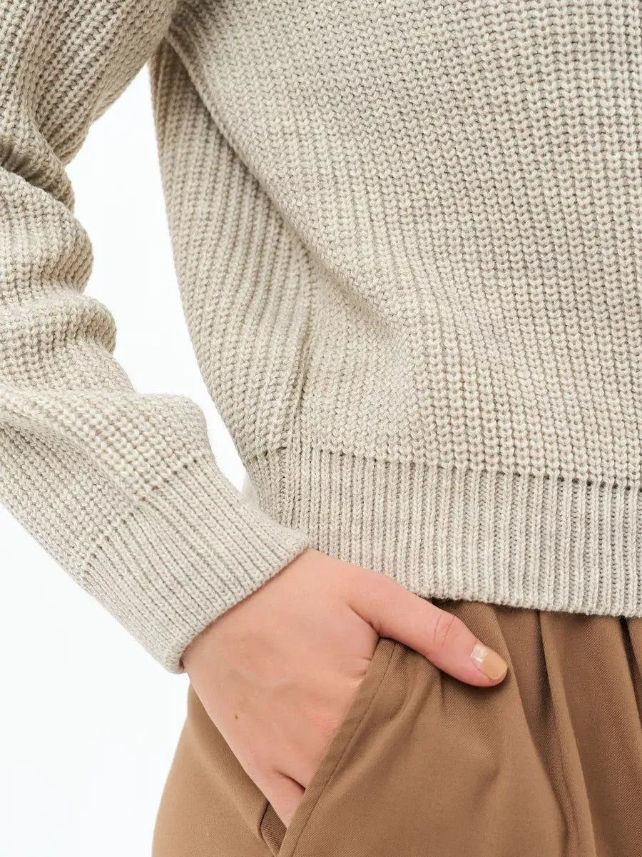 Astra Sweater by Lauven, light beige oversized knit with rib texture and relaxed fit, showcasing comfort and style.