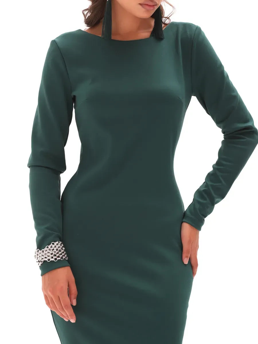 Elegant model wearing the Aurora Midi Dress by Lauven, showcasing its rich emerald bodycon fit and modern style.