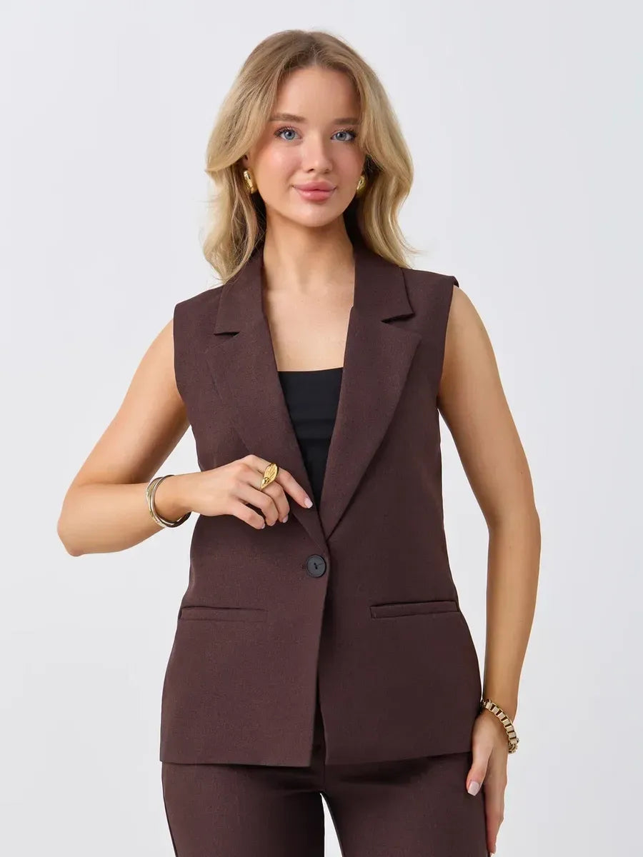Cacao Suit Set by Lauven – Sleeveless chocolate vest worn by a model, showcasing a chic and polished look.