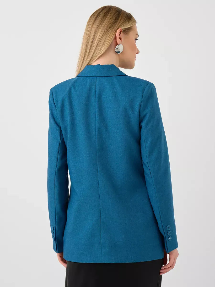 Back view of the Diana Blazer by Lauven, showcasing its classic cropped design and elegant silhouette.