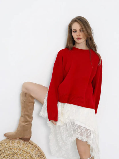 Ember Pullover by Lauven, oversized cropped red sweater worn with a white lace skirt.