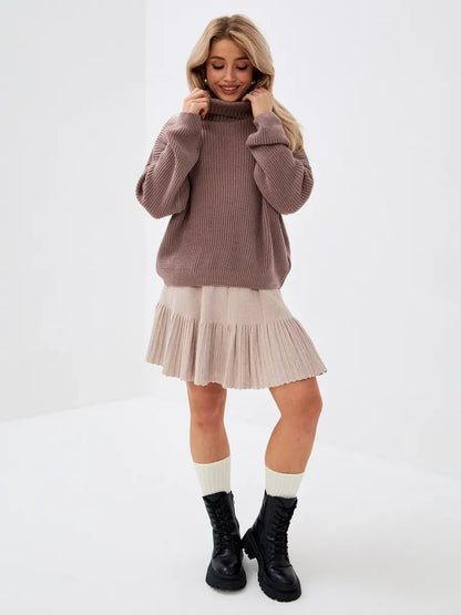 Florence Sweater by Lauven, oversized knit turtleneck in warm coffee hue, styled with a feminine skirt.