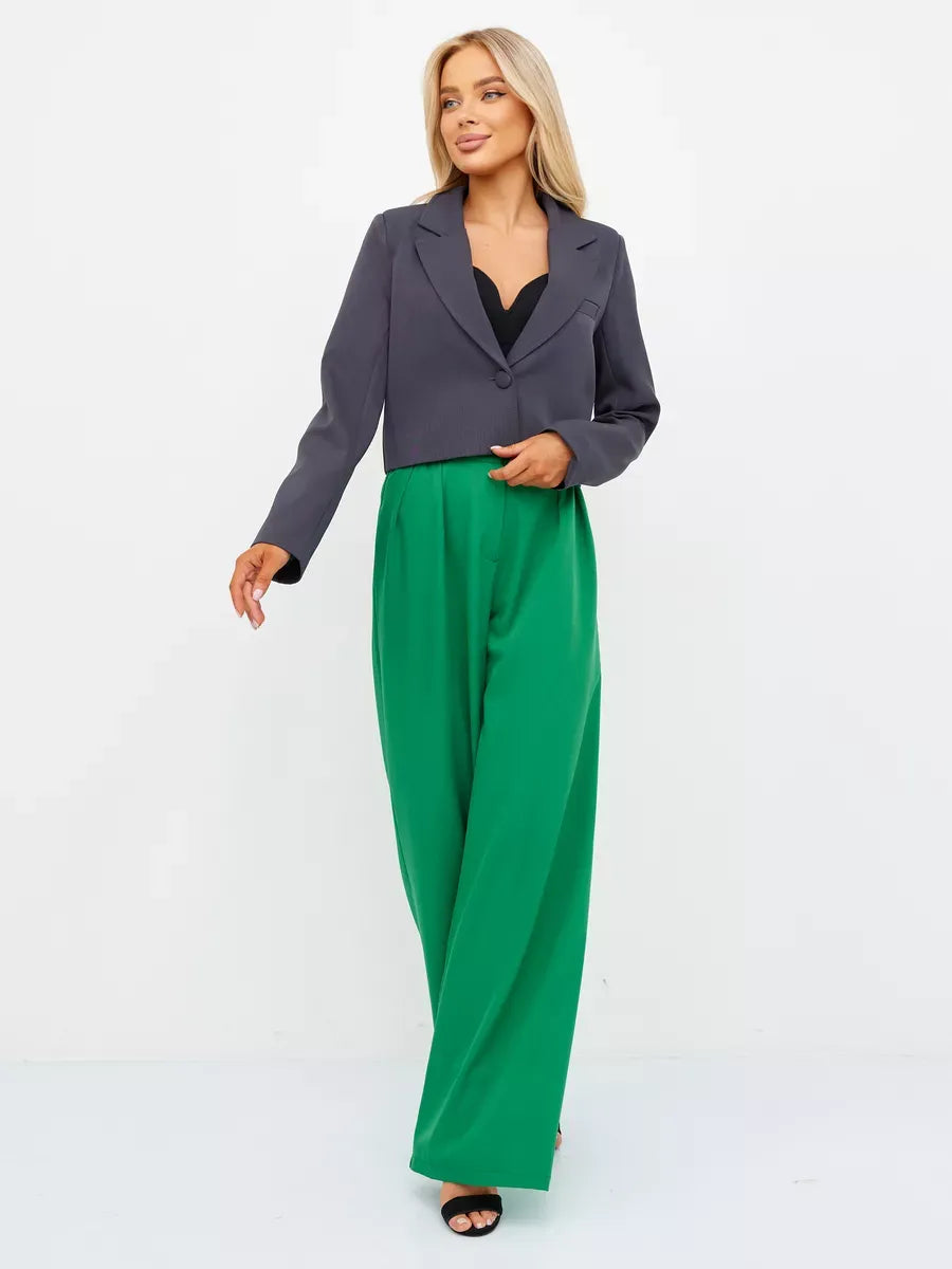 Graphite Blazer by Lauven styled with green wide-leg pants, showcasing a modern cropped silhouette in dark gray.