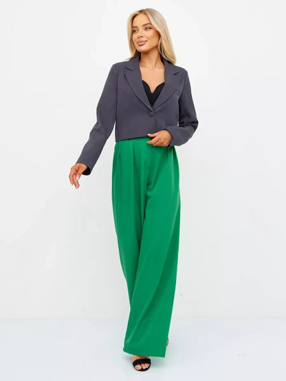 Graphite Blazer by Lauven styled with green wide-leg pants, showcasing a modern cropped silhouette in dark gray.