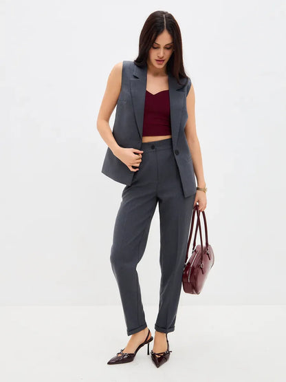Graphite Suit Set by Lauven featuring a sleeveless vest and high-waist pants for a chic look.