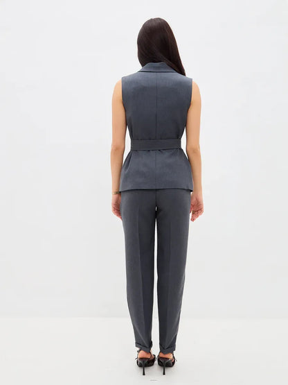 Graphite Suit Set by Lauven, showcasing a sleeveless vest and high-waist trousers from the back view.