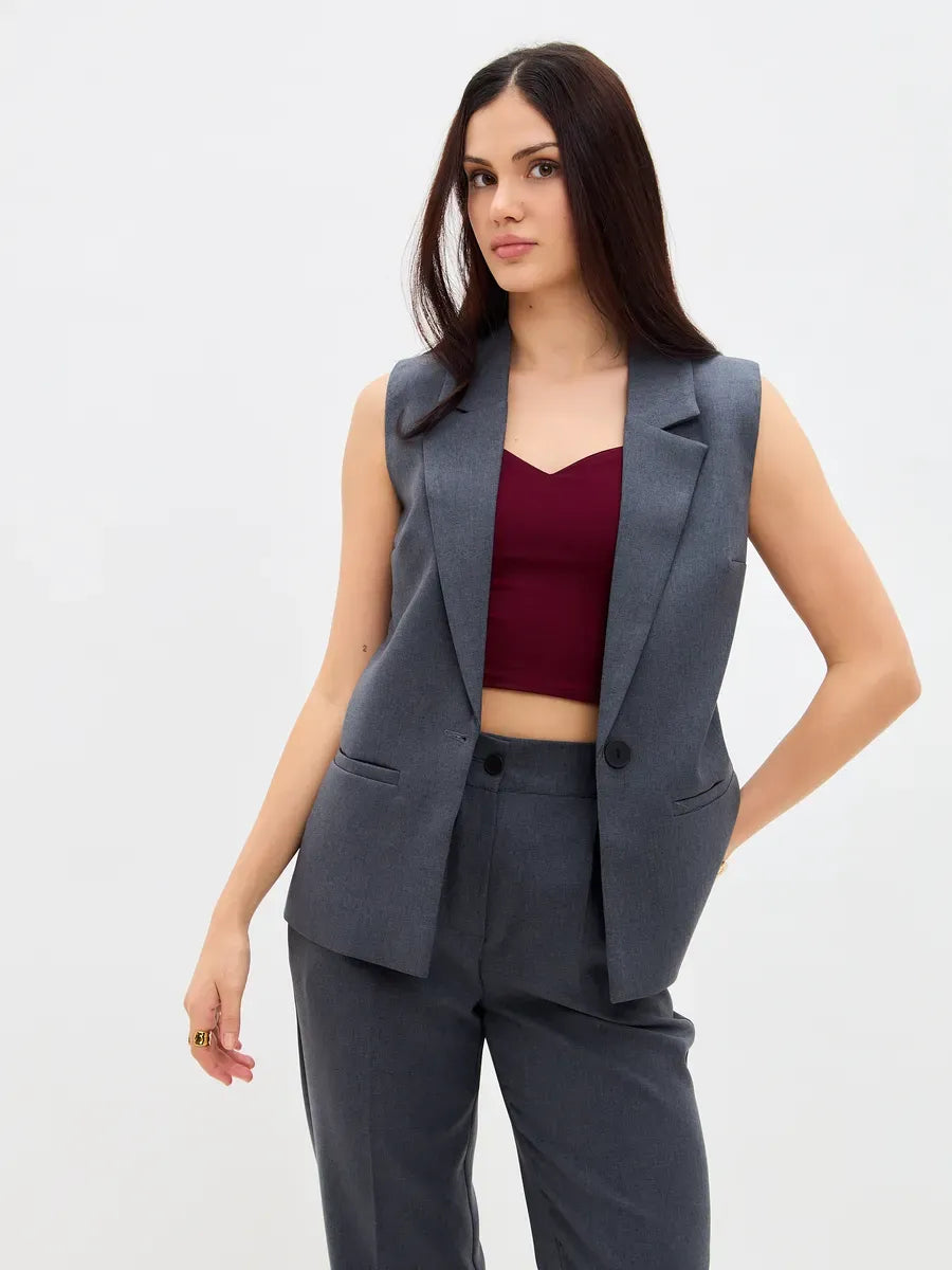 Graphite Suit Set by Lauven featuring a sleeveless vest and high-waist pants for a chic and modern look.