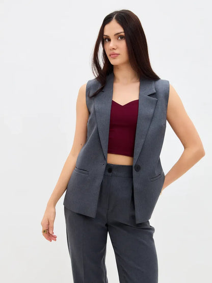 Graphite Suit Set by Lauven featuring a sleeveless vest and high-waist pants for a chic and modern look.