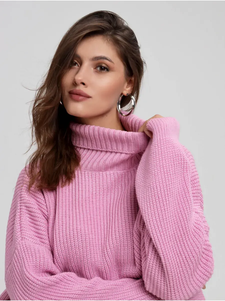 Iris Sweater by Lauven in soft pink with oversized knit and turtleneck, showcasing a modern and comfortable style.