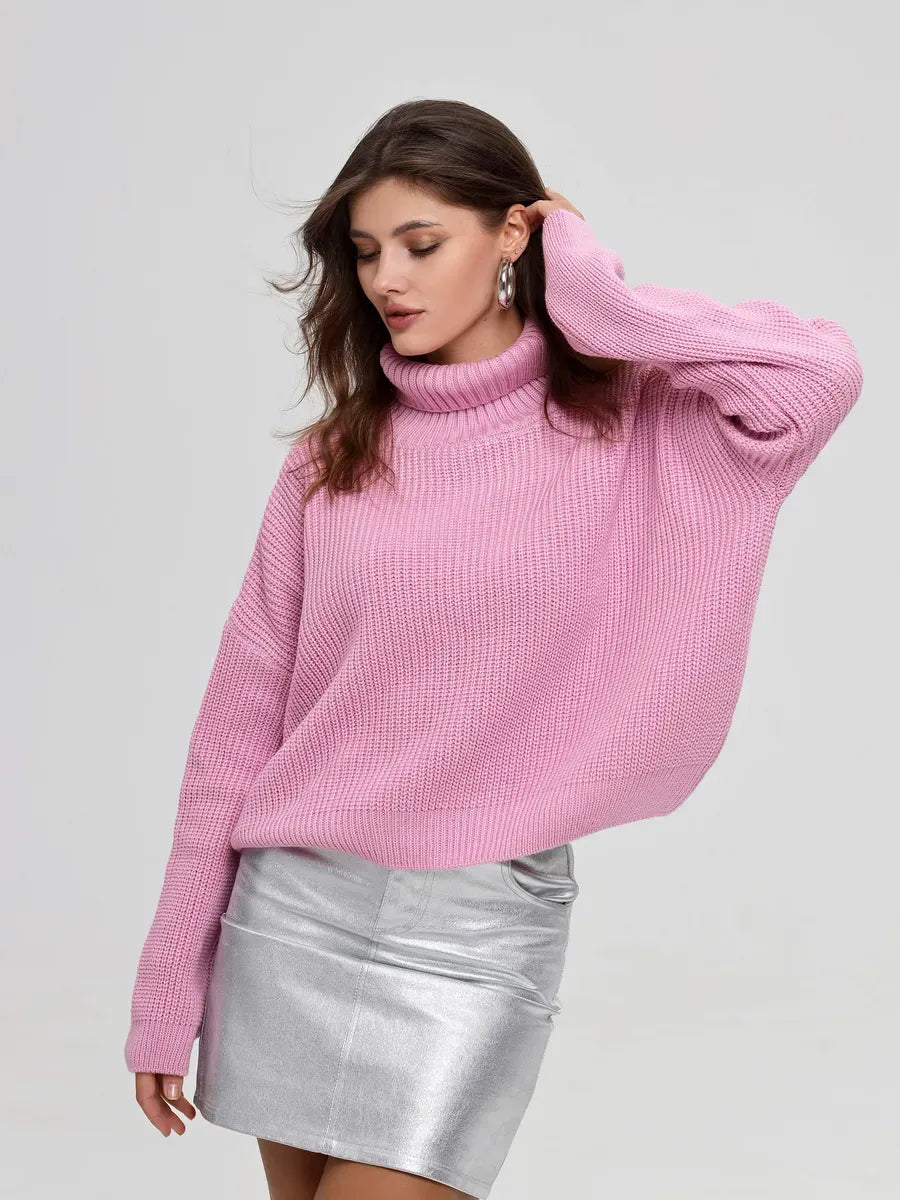 Iris Sweater by Lauven in pink, featuring an oversized fit and turtleneck, perfect for layering.