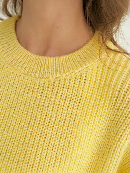 Lemonade Sweater by Lauven, vibrant oversized knit in bright lemon-yellow, showcasing the soft texture and comfortable design.