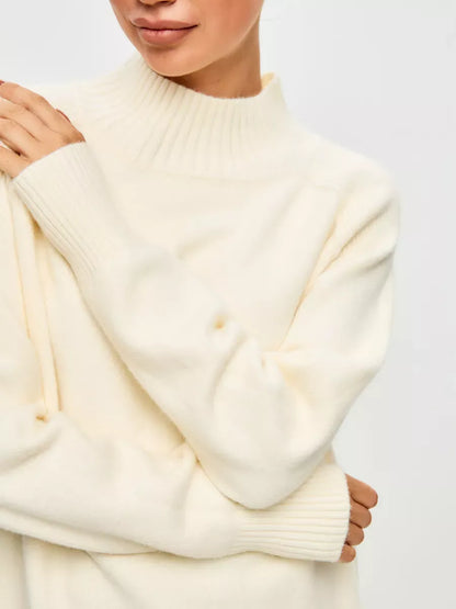 Luna Sweater by Lauven, oversized cashmere blend in ivory with a high neck showcasing elegance and comfort.