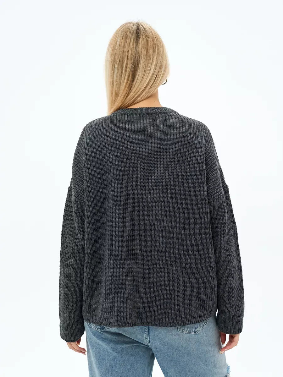 Back view of the Luna Sweater in charcoal gray, oversized knit by Lauven, showcasing its relaxed silhouette and textured design.
