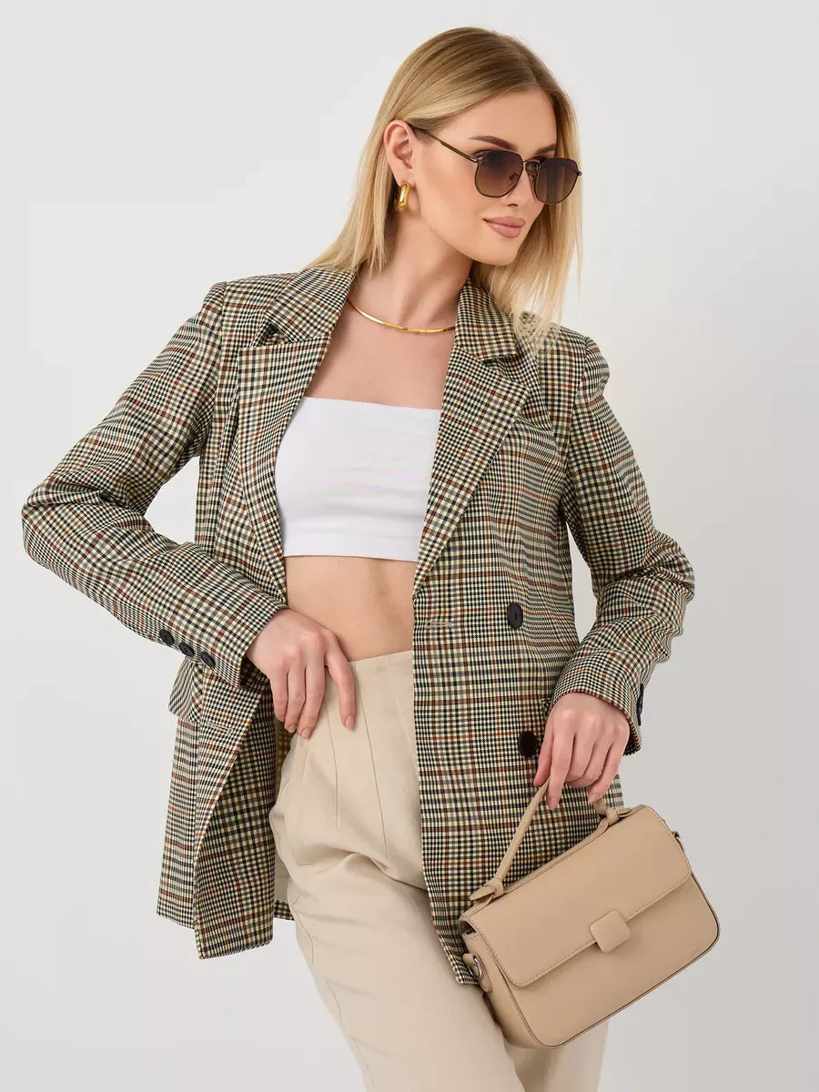 Maple Blazer by Lauven featuring an oversized brown checked design, styled with a white crop top and beige handbag.
