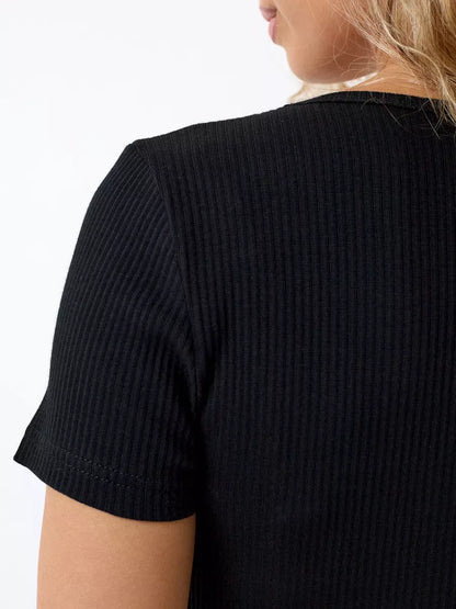 Onyx Midi Dress by Lauven showcasing the ribbed knit fabric and sleek silhouette in elegant black.